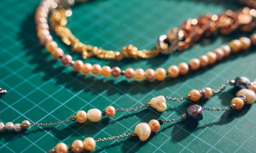 Close up of vintage jewelry lying on the desk